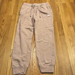 Pink women’s size medium Nike sweatpants no stains no tags